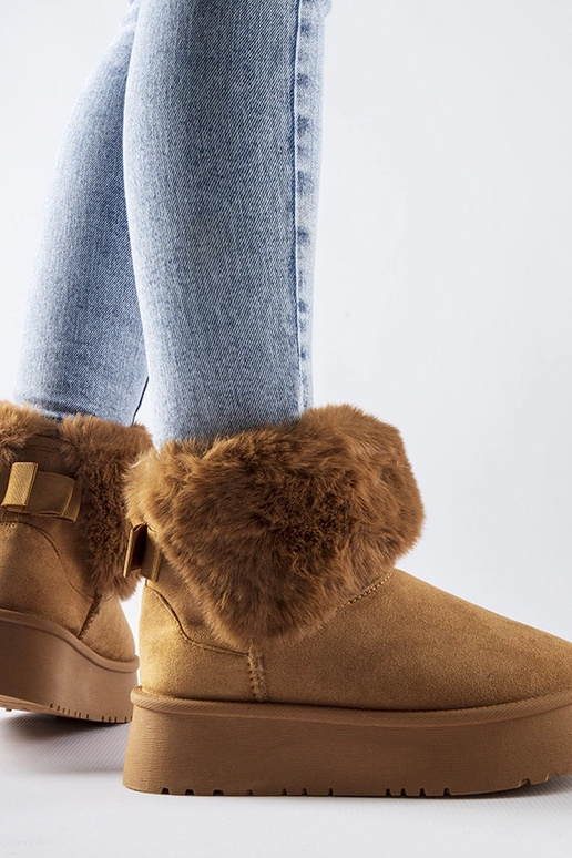 Bottines de neige brunes ornées de...