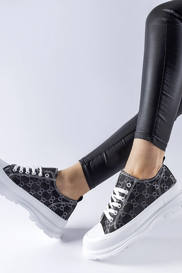 Baskets noires décorées du... 2