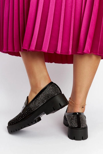 Mocassins noirs décorés de... 2