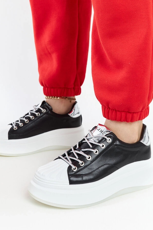 Bottines sneakers noires à plateforme... Bottines sneakers noires à plateforme...