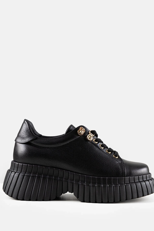 Baskets en cuir noires à plateforme... Baskets en cuir noires à plateforme...