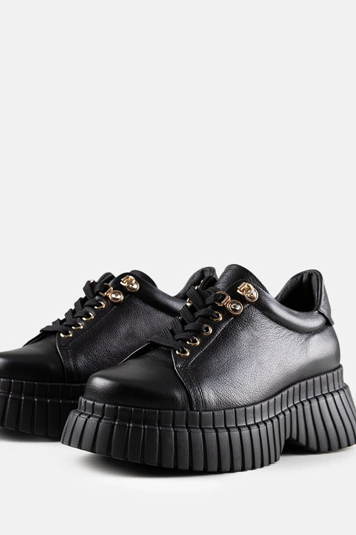 Baskets en cuir noires à plateforme... Baskets en cuir noires à plateforme...