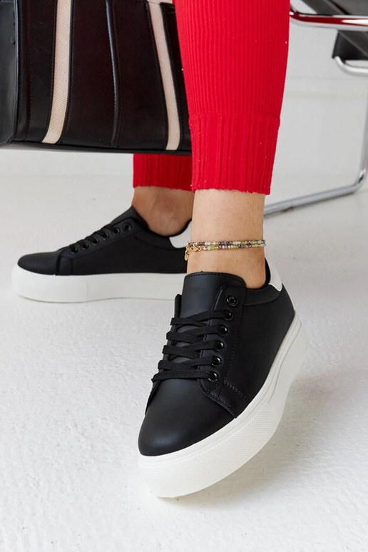 Baskets noires et blanches à semelle...