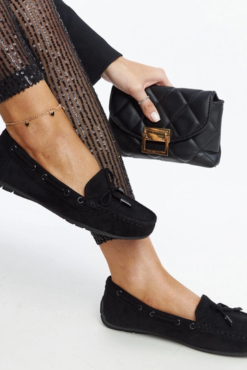 Mocassins noirs avec noeud...