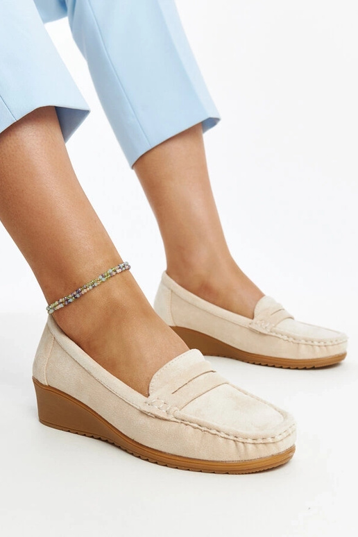 Mocassins compensés en daim beige...