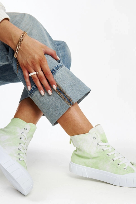 Baskets montantes en toile vert clair...