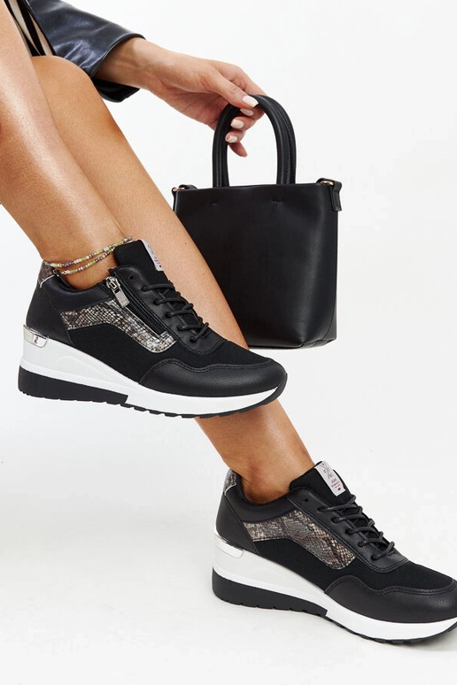 Baskets compensées noires pour femme...