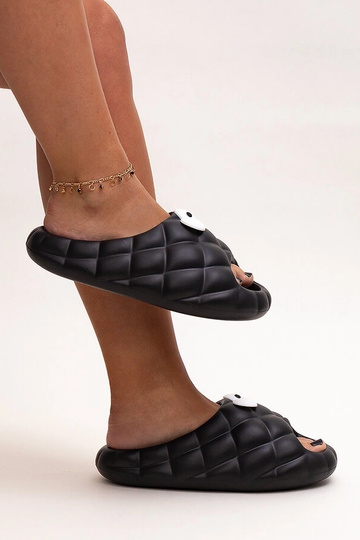 Tongs en mousse noire avec...