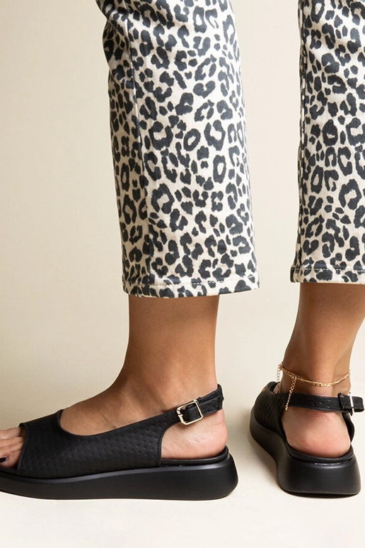 Sandales noires à semelle plus... Sandales noires à semelle plus...