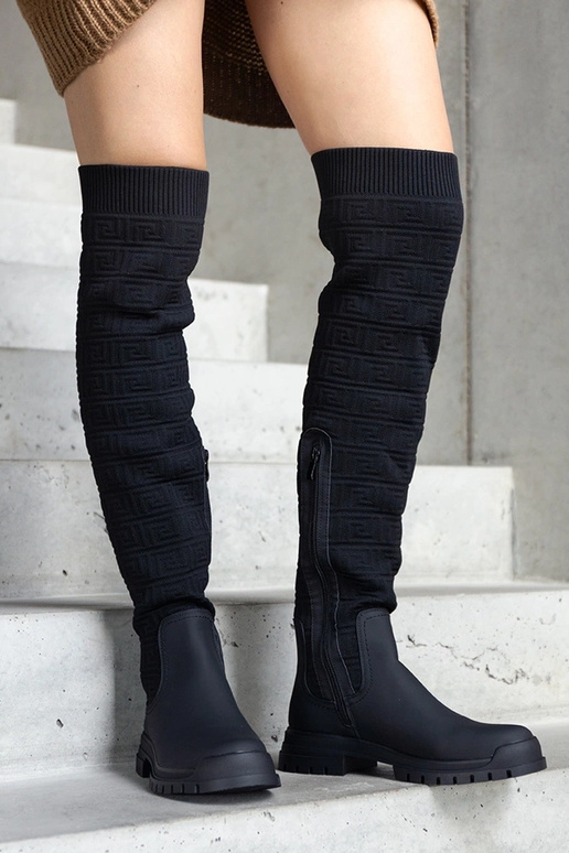 Bottes en tissu noir avec finition...