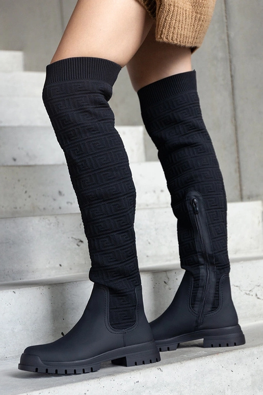 Bottes en tissu noir avec finition...
