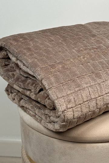 Couverture matelassée beige