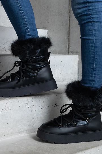 Bottes de neige noires...