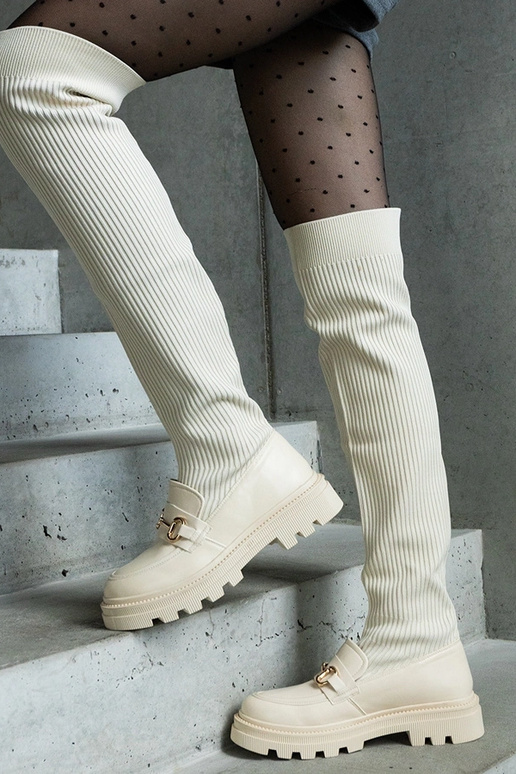 Bottes beige clair avec tige...