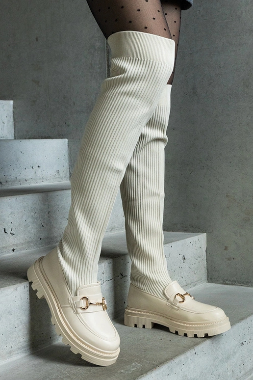Bottes beige clair avec tige...