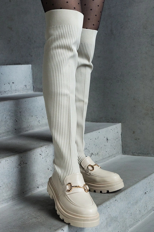 Bottes beige clair avec tige...