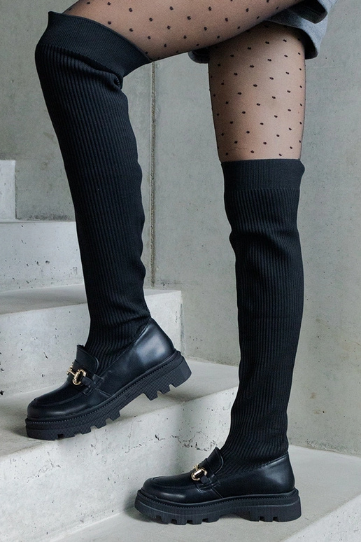 Bottes noires avec tige élastique à... Bottes noires avec tige élastique à...