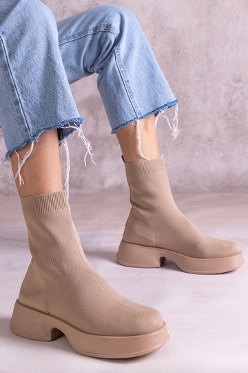 Bottines beiges à tige... 2