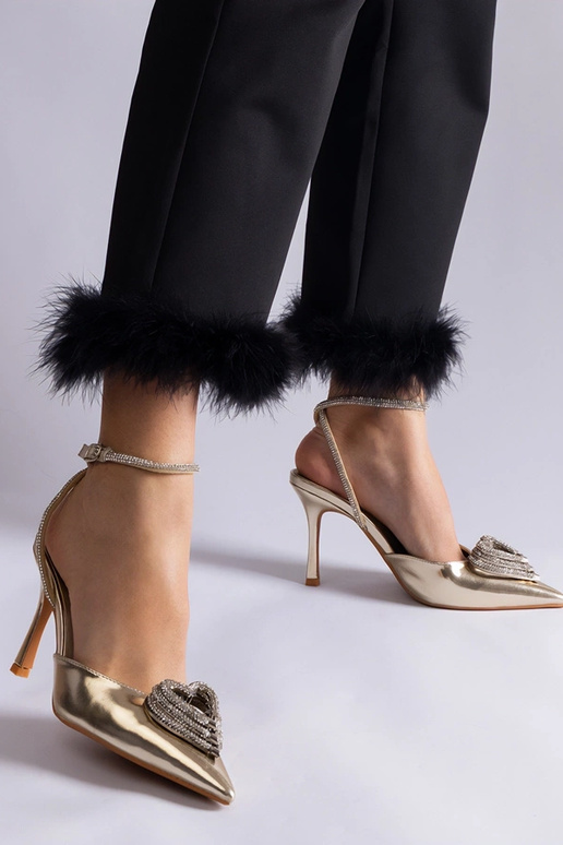 Escarpins dorés à talon ouvert ornés...