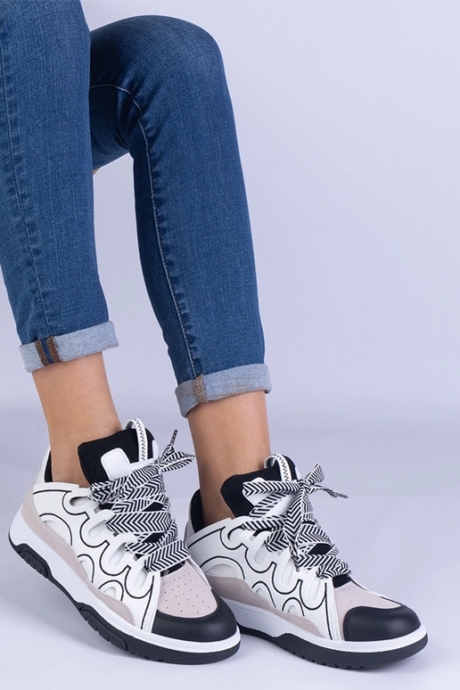 Baskets noires pour femmes avec... Baskets noires pour femmes avec...