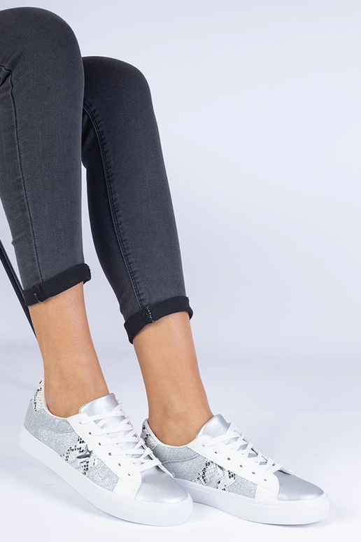 Baskets argentées pour femme à motif... Baskets argentées pour femme à motif...