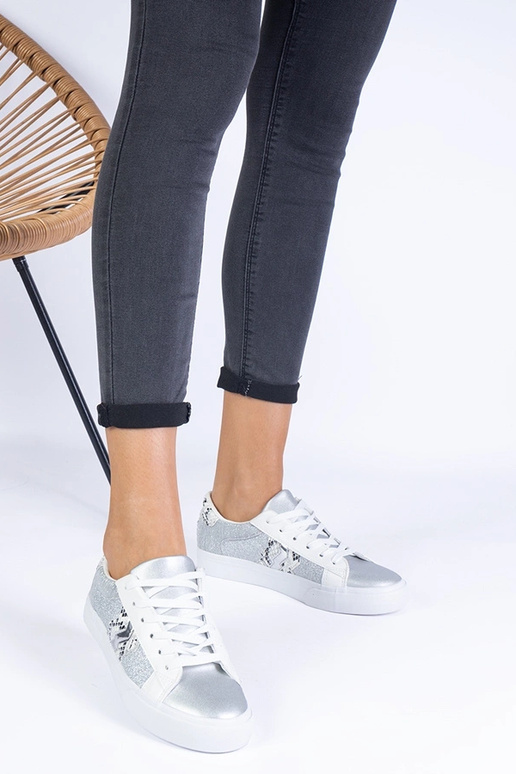 Baskets argentées pour femme à motif... Baskets argentées pour femme à motif...