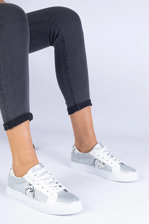 Baskets argentées pour femme à motif... Baskets argentées pour femme à motif...