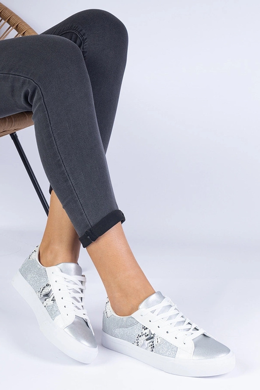 Baskets argentées pour femme à motif... Baskets argentées pour femme à motif...