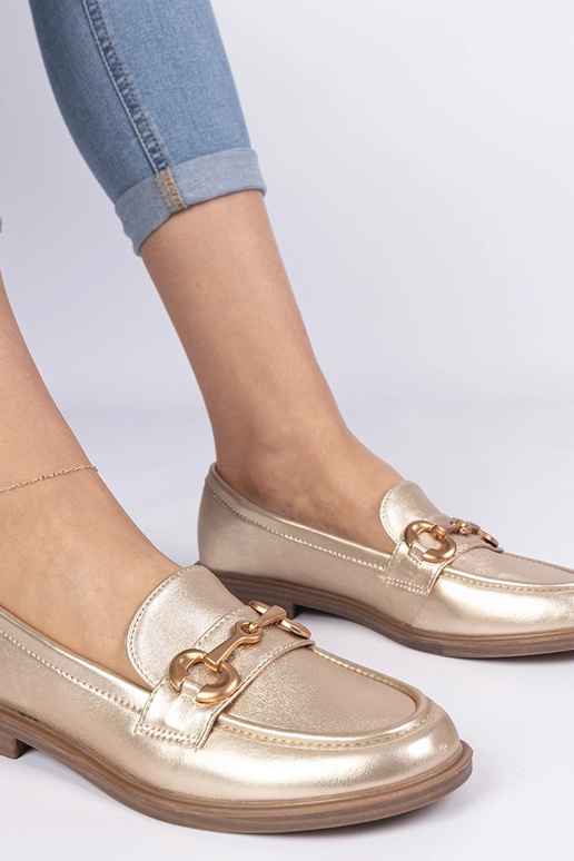 Mocassins dorés pour femmes avec... Mocassins dorés pour femmes avec...