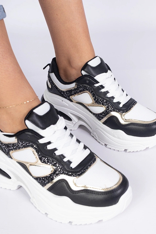 Baskets noires pour femmes ornées de... Baskets noires pour femmes ornées de...