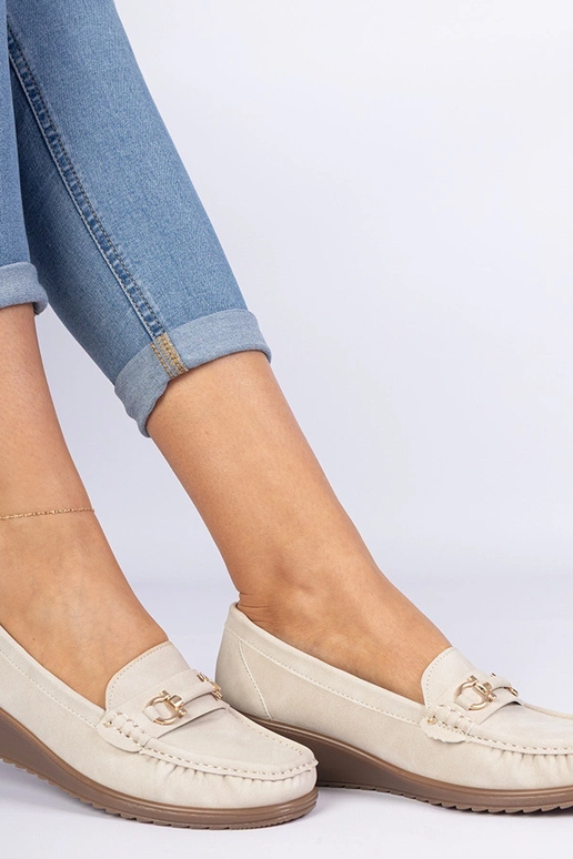 Mocassins beiges pour femmes à... Mocassins beiges pour femmes à...