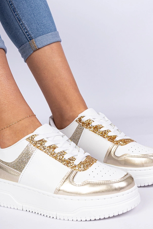 Baskets dorées pour femmes sur... Baskets dorées pour femmes sur...