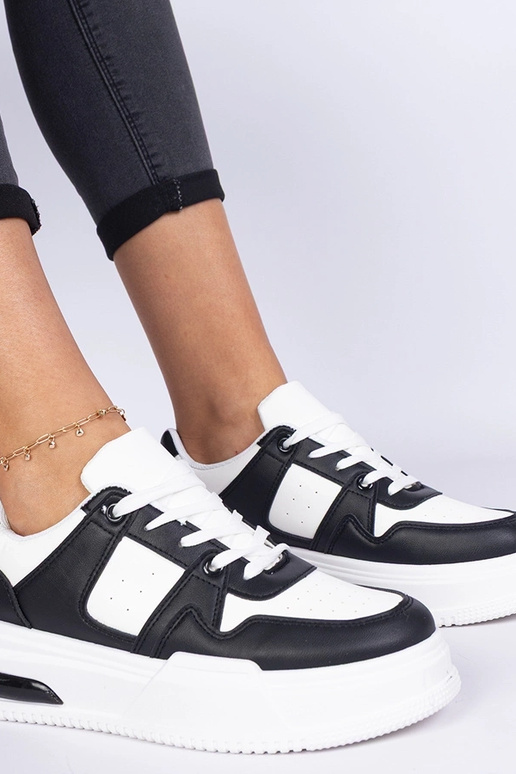 Baskets femme noir et blanc à semelle... Baskets femme noir et blanc à semelle...