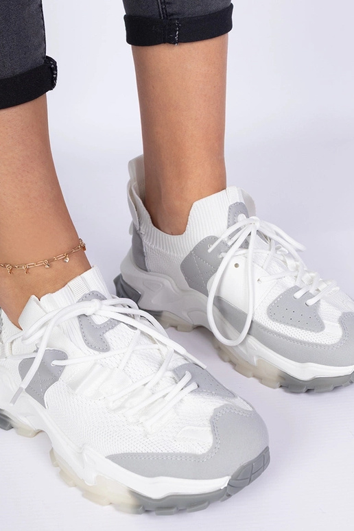 Baskets femme blanches avec tige en... Baskets femme blanches avec tige en...