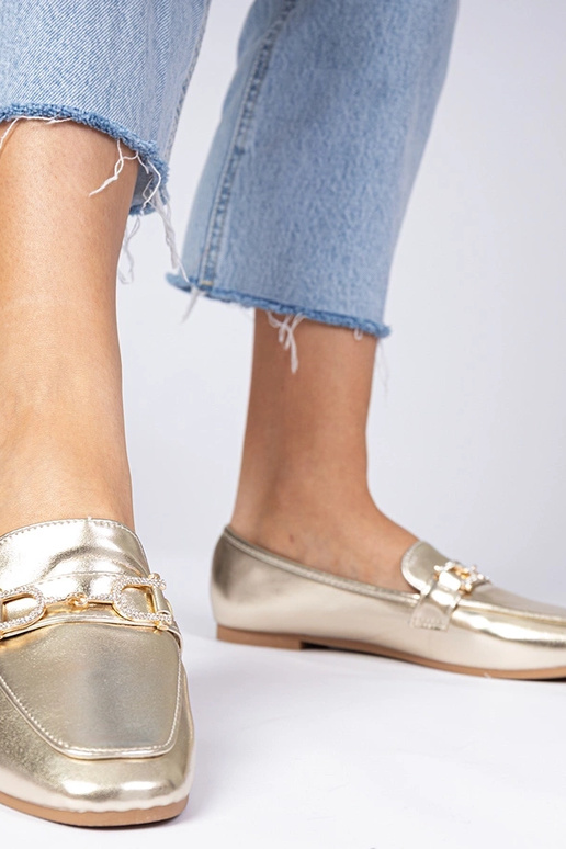 Mokasins dorés élégants avec... Mokasins dorés élégants avec...