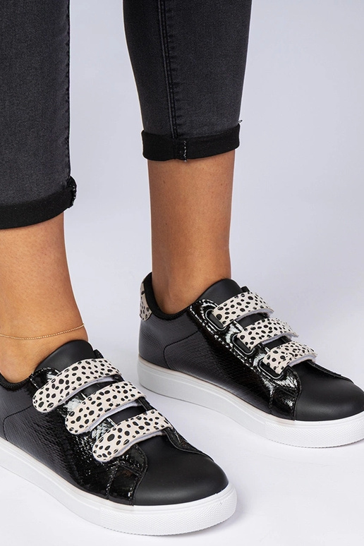 Baskets noires avec finition animale... Baskets noires avec finition animale...