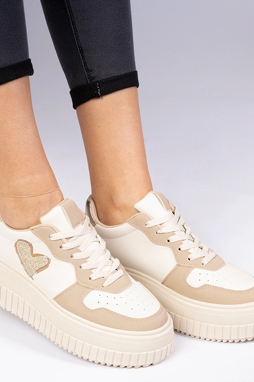 Baskets brunes pour femmes avec un... Baskets brunes pour femmes avec un...