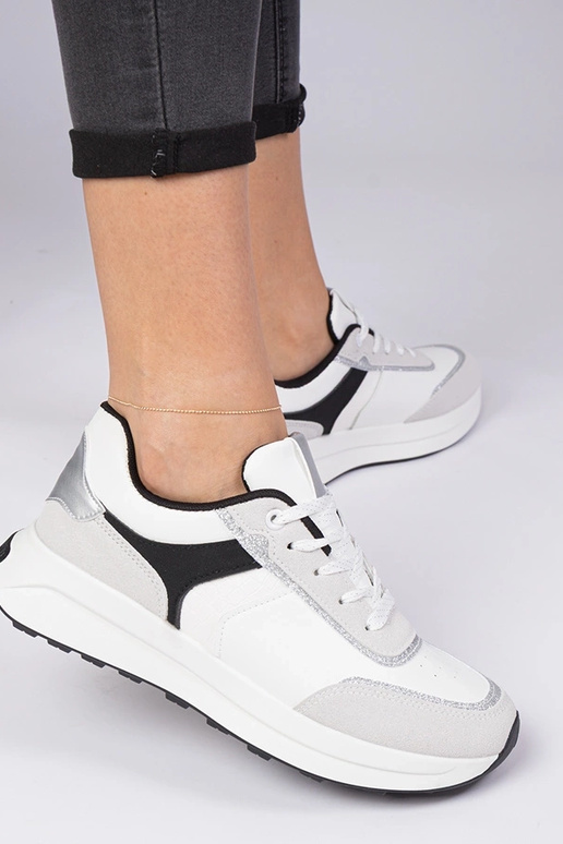 Baskets blanches pour femmes avec... Baskets blanches pour femmes avec...