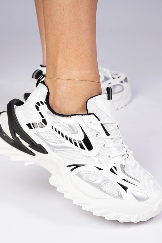 Baskets sportives blanches à semelle... Baskets sportives blanches à semelle...