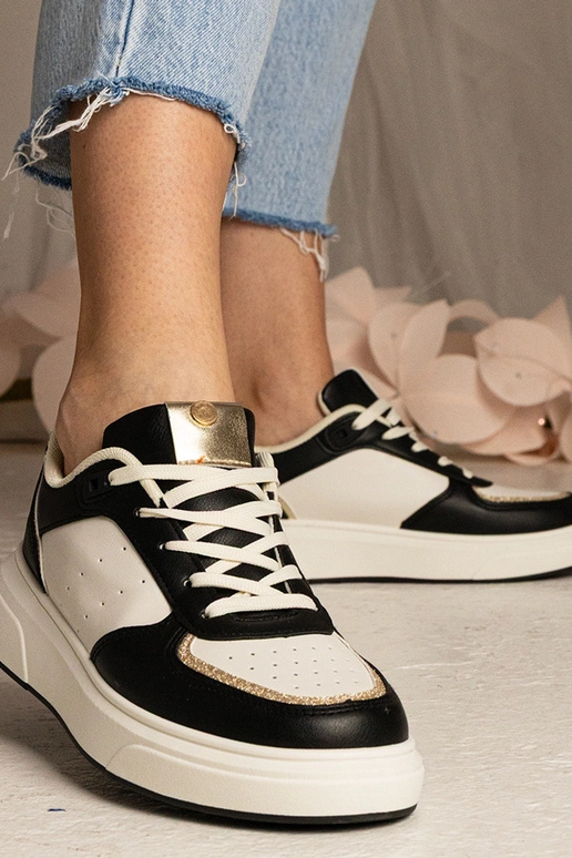 Baskets noires pour femmes avec... Baskets noires pour femmes avec...