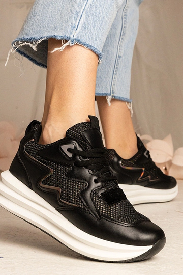 Baskets noires avec élément...