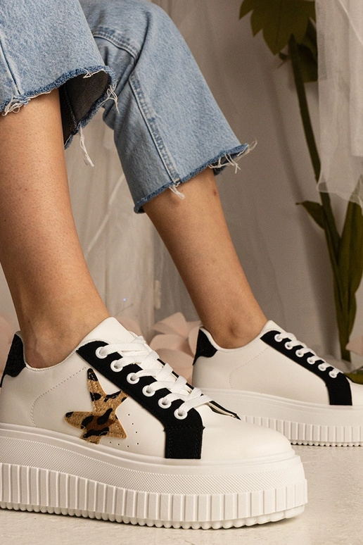 Baskets bicolores blanches et noires... Baskets bicolores blanches et noires...