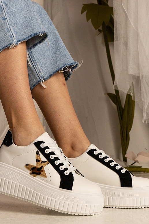 Baskets bicolores blanches et noires... Baskets bicolores blanches et noires...