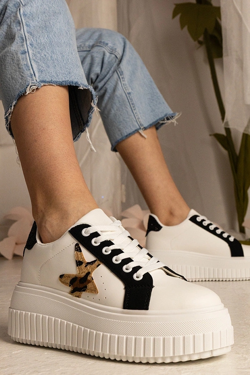 Baskets bicolores blanches et noires... Baskets bicolores blanches et noires...