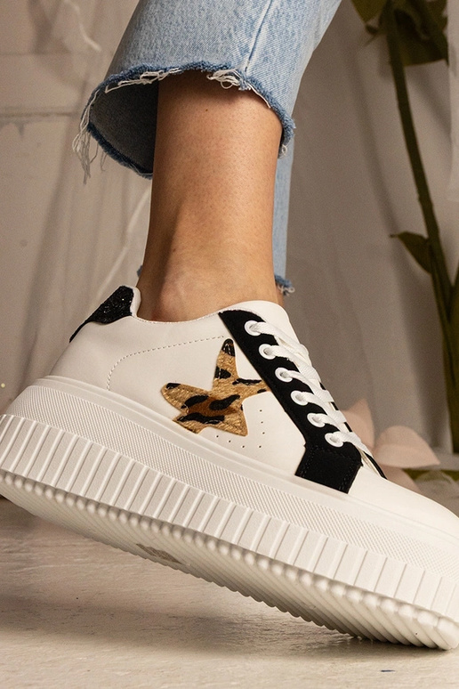 Baskets bicolores blanches et noires... Baskets bicolores blanches et noires...