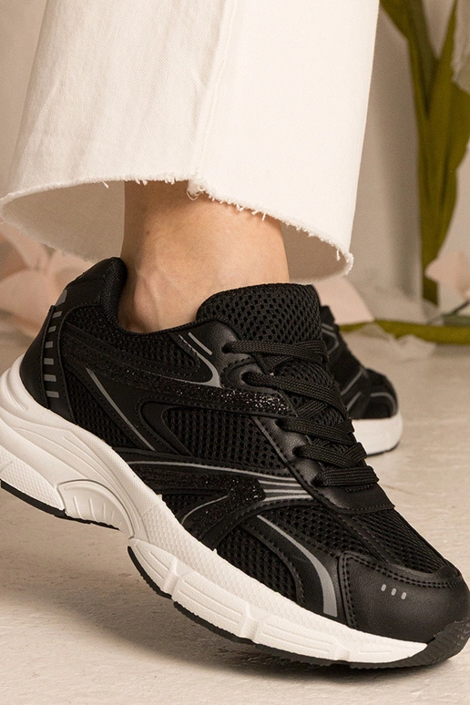 Baskets noires pour femmes sportives... Baskets noires pour femmes sportives...