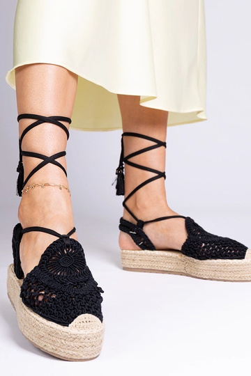 Sandales noires tressées à...
