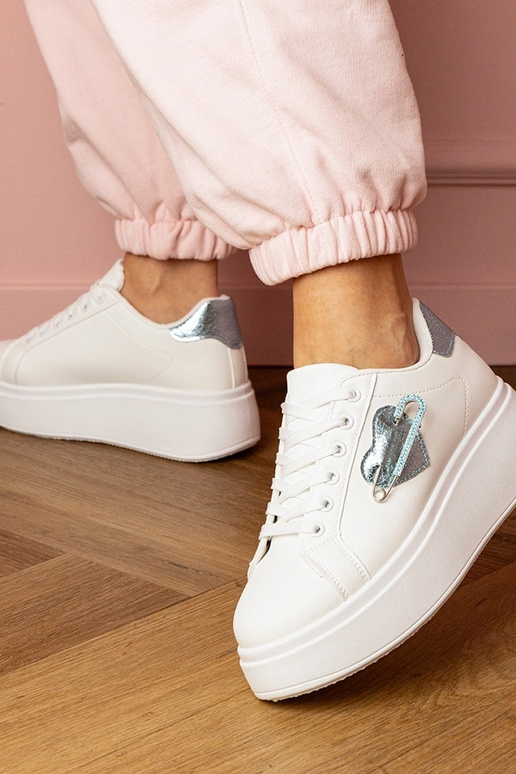 Baskets blanches pour femmes avec... Baskets blanches pour femmes avec...