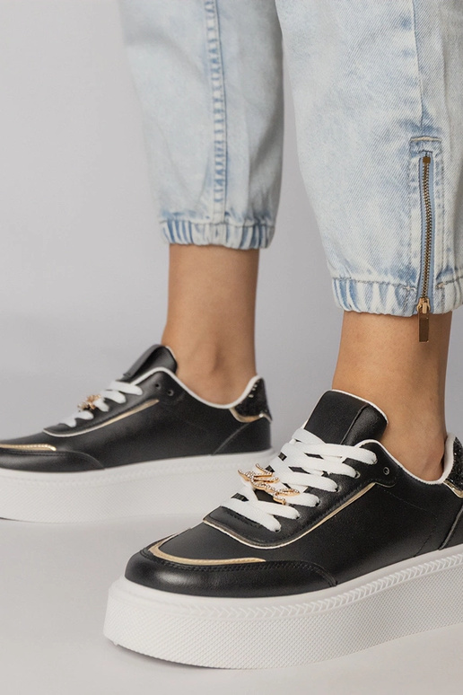 Baskets de sport noires avec...