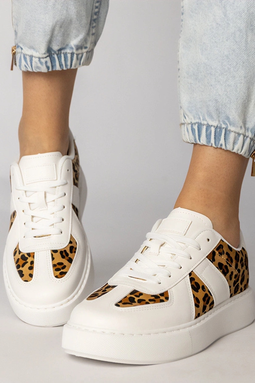 Baskets de sport blanches à motif...